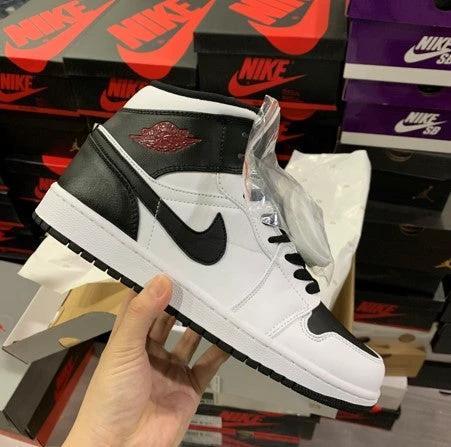 Air Jordan 1 Mid Black And White Reverse by Air Jordan