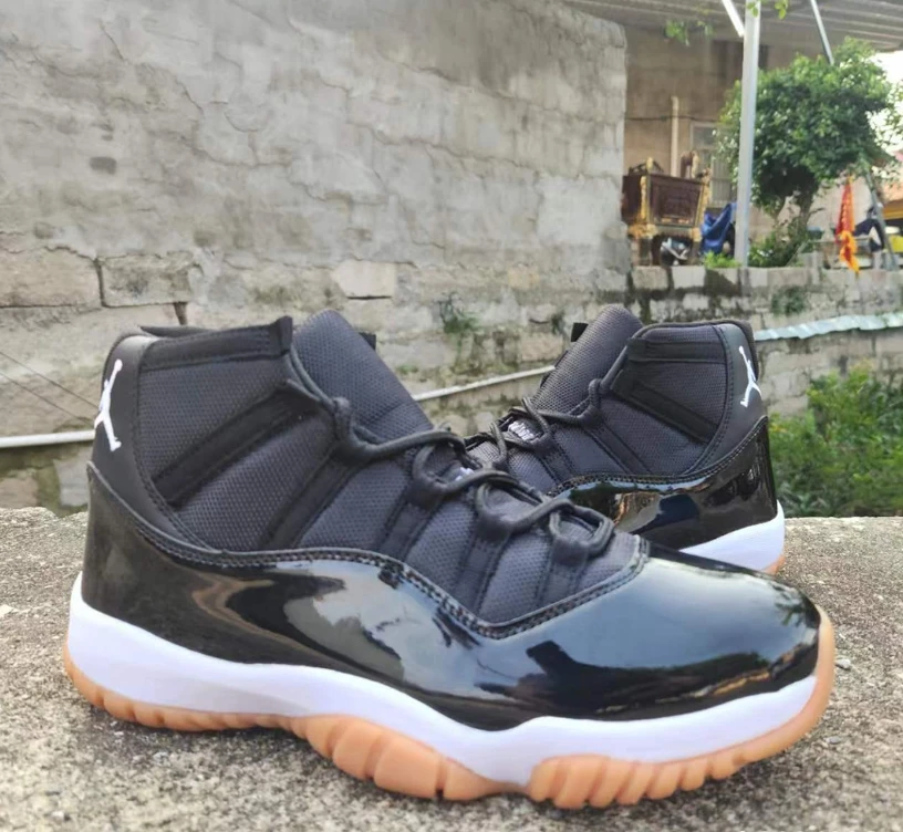 Air Jordan 11 Black Gum Sneakers by Air Jordan