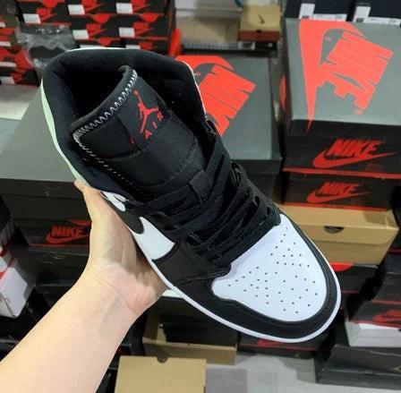 Air Jordan 1 Mid Black And White Red by Air Jordan