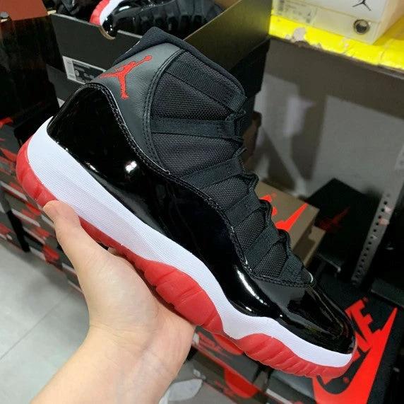 Air Jordan 11 Bred Black Red by Air Jordan