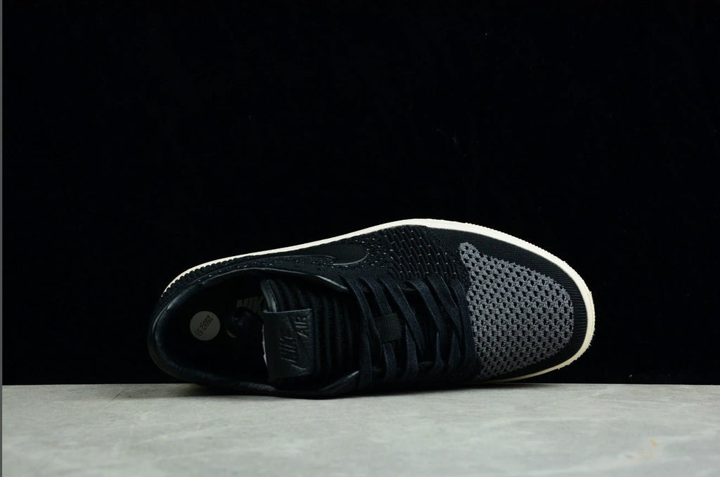 Air Jordan 1 Retro Low Flyknit Black Guava Ice by Air Jordan