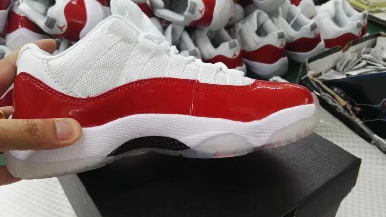 Air Jordan 11 Low Varsity Red by Air Jordan