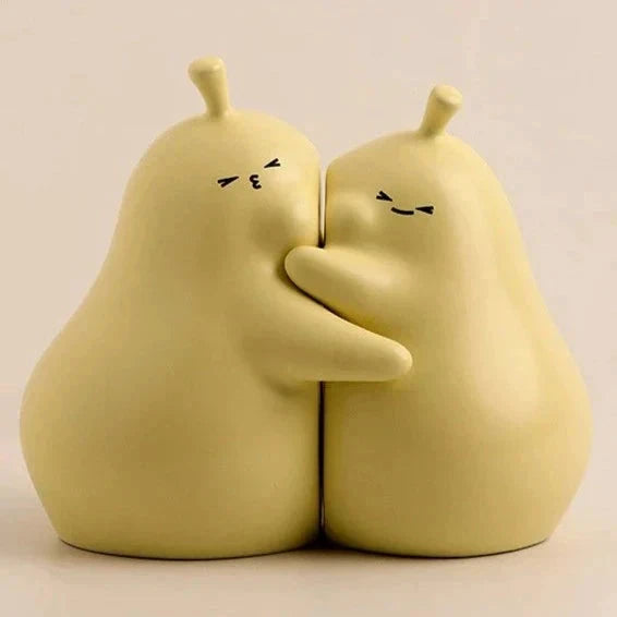 Hugging Pear Bookends by Bowlift