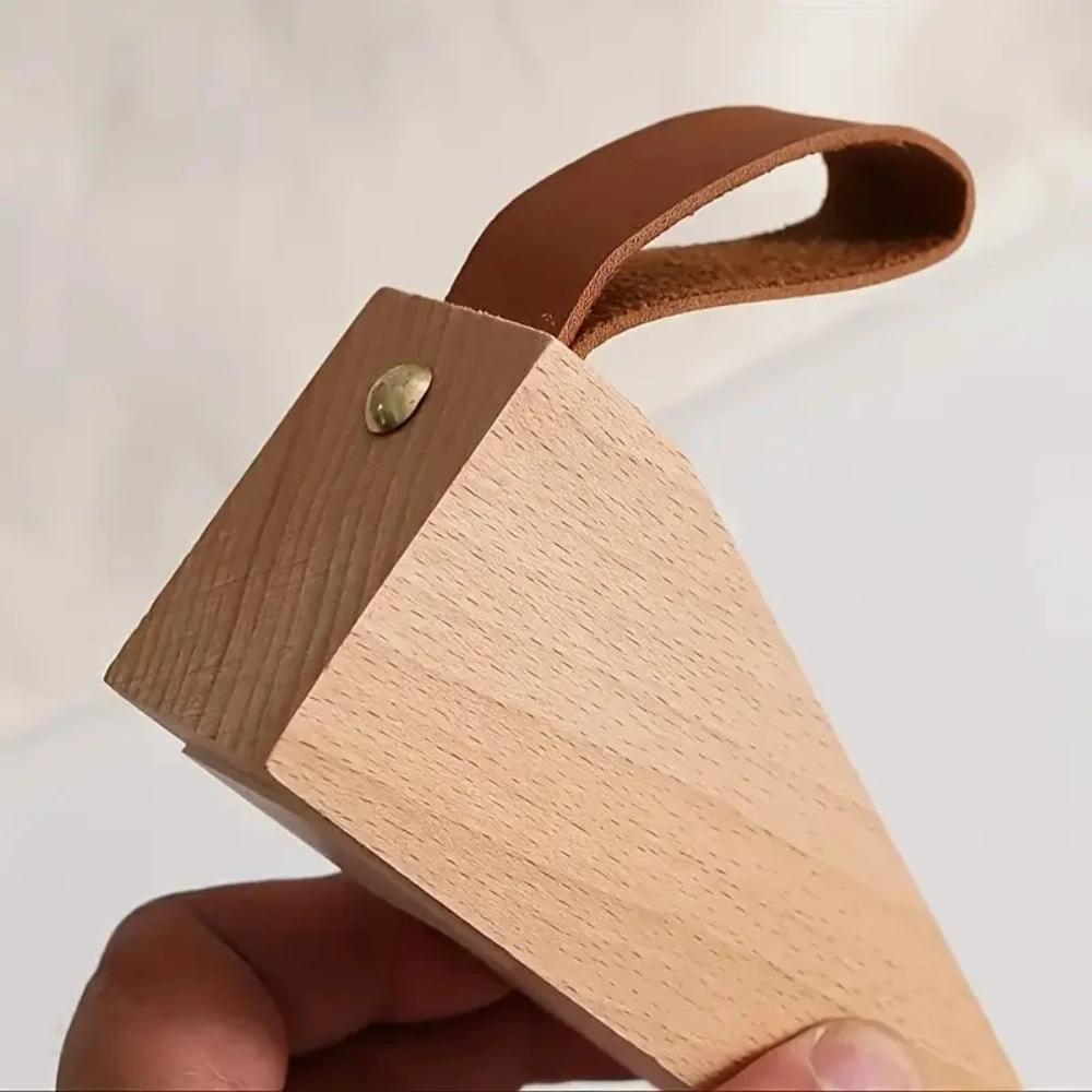 Sleek Wooden Door Stopper by Casa & Beyond.