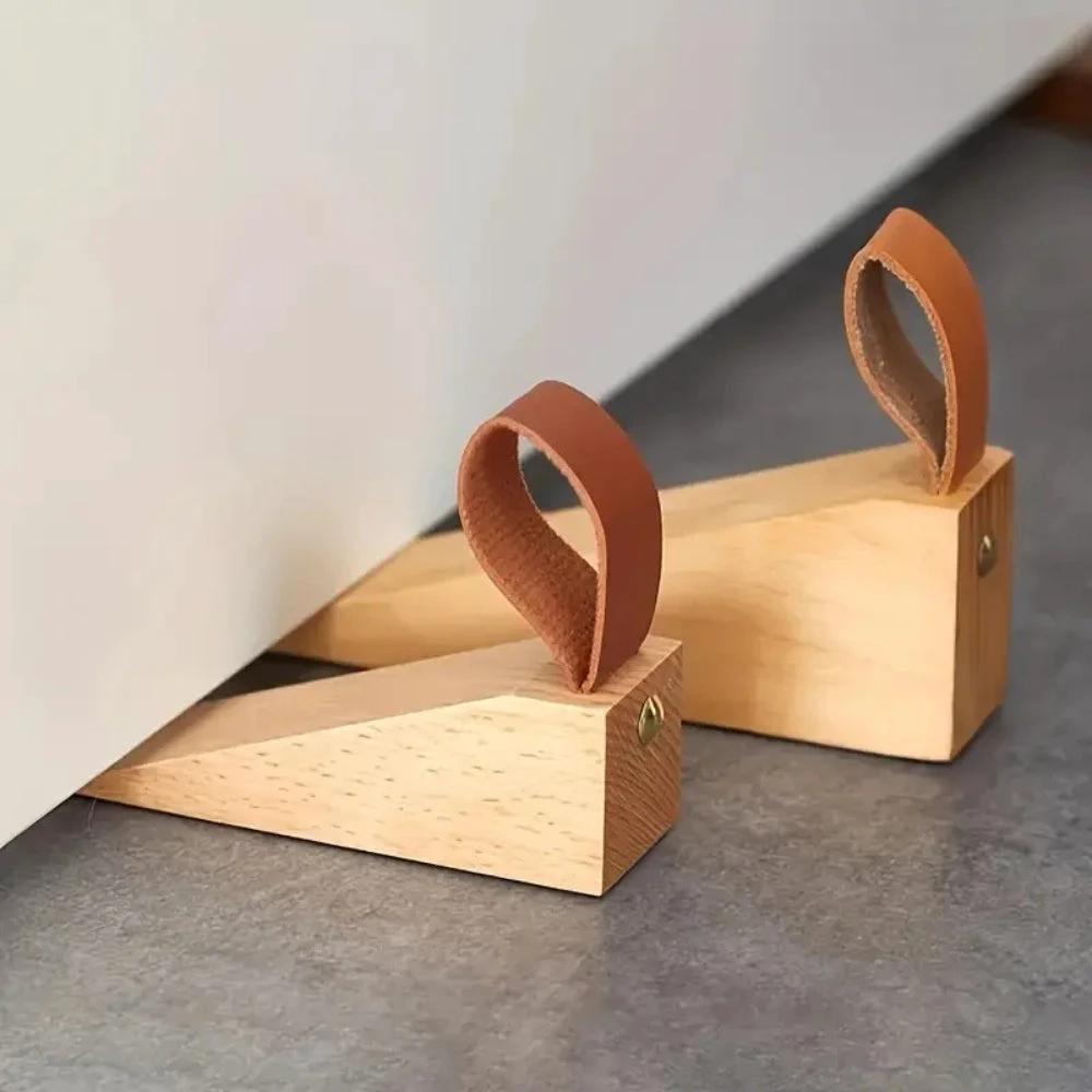 Sleek Wooden Door Stopper by Casa & Beyond.