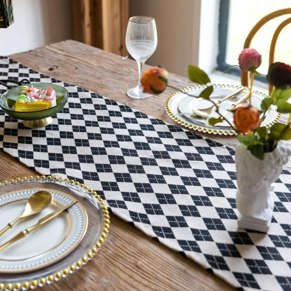 Tasseled Diamond Checkered Table Runner by Casa & Beyond