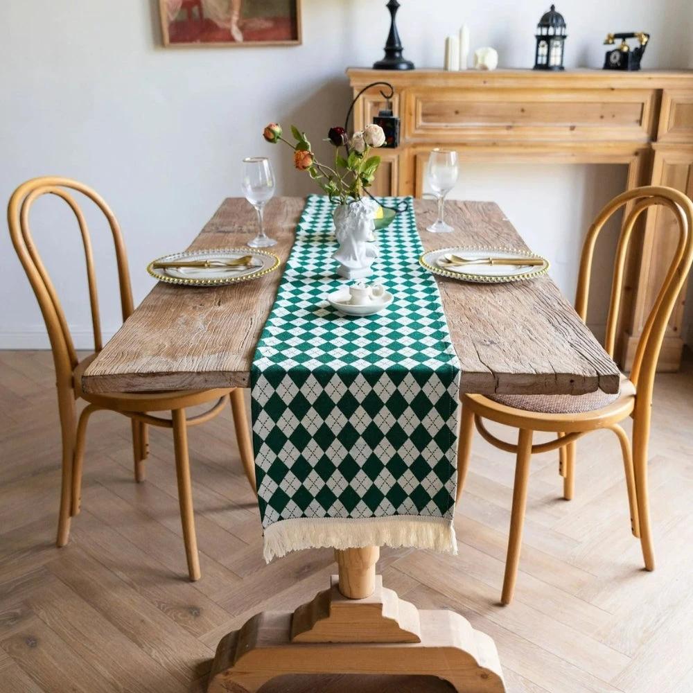 Tasseled Diamond Checkered Table Runner by Casa & Beyond