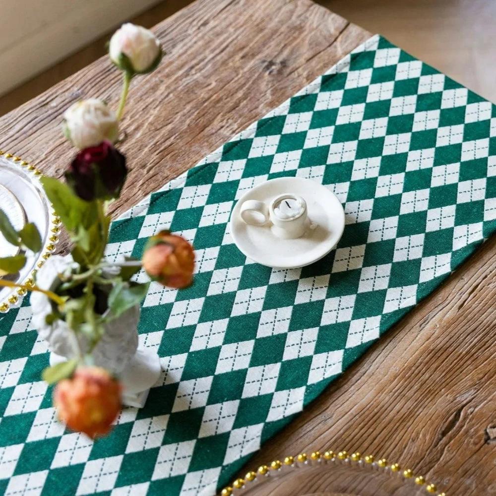Tasseled Diamond Checkered Table Runner by Casa & Beyond
