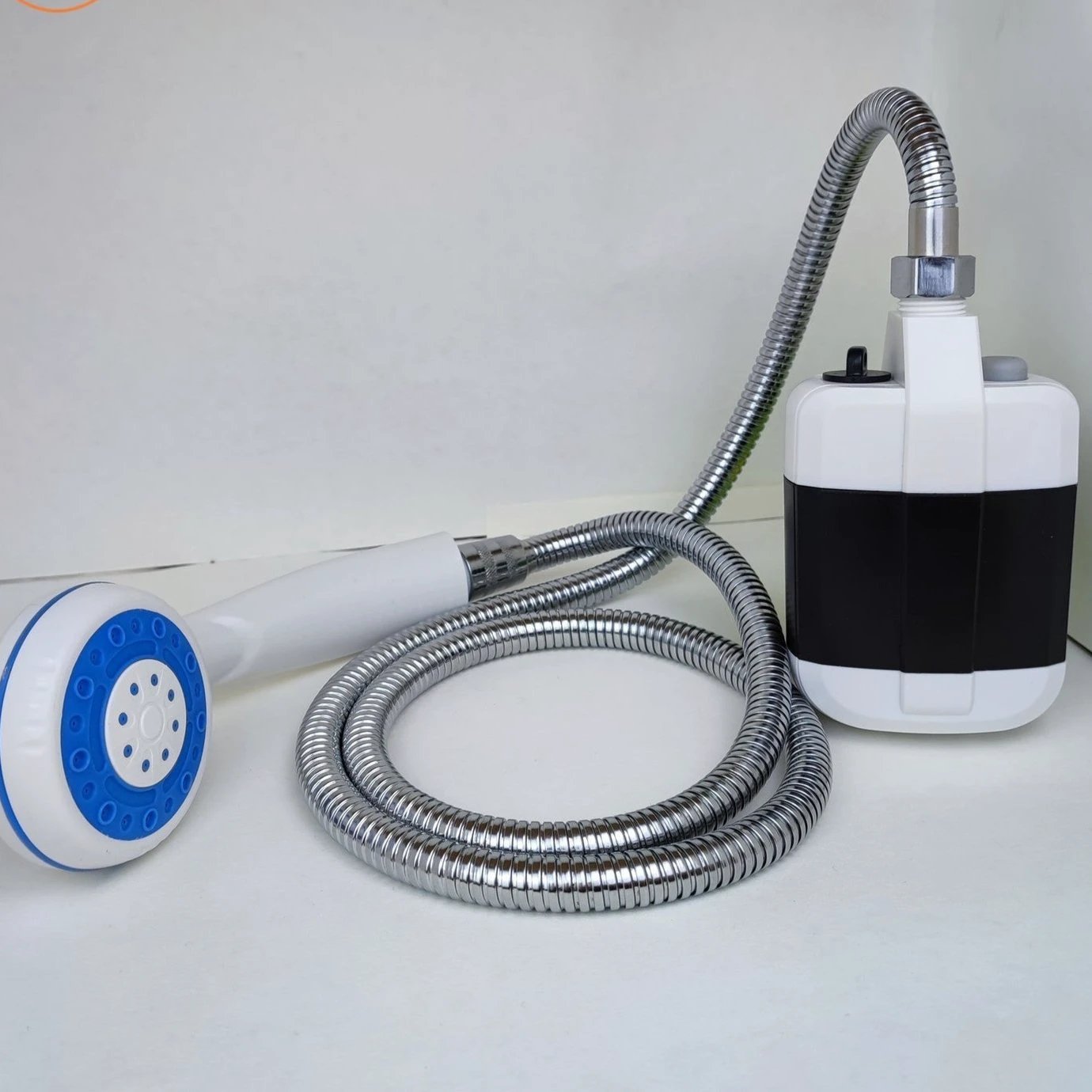 Aquacharge portable electric shower Bowlift by Bowlift