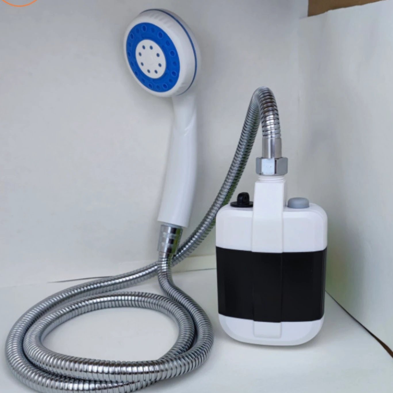 Aquacharge portable electric shower Bowlift by Bowlift