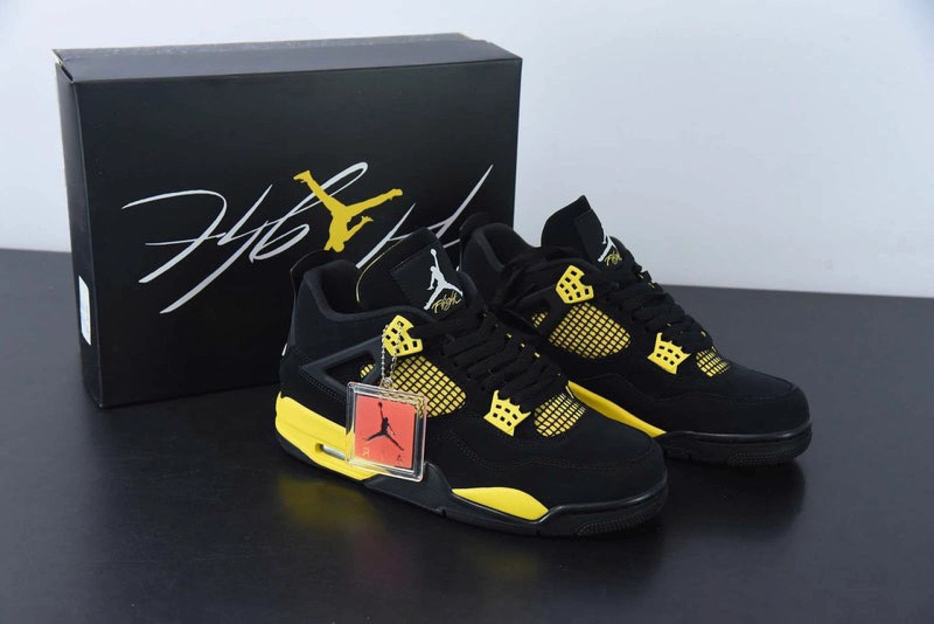 Air Jordan 4 Retro Thunder Yellow (2023) by Air Jordan