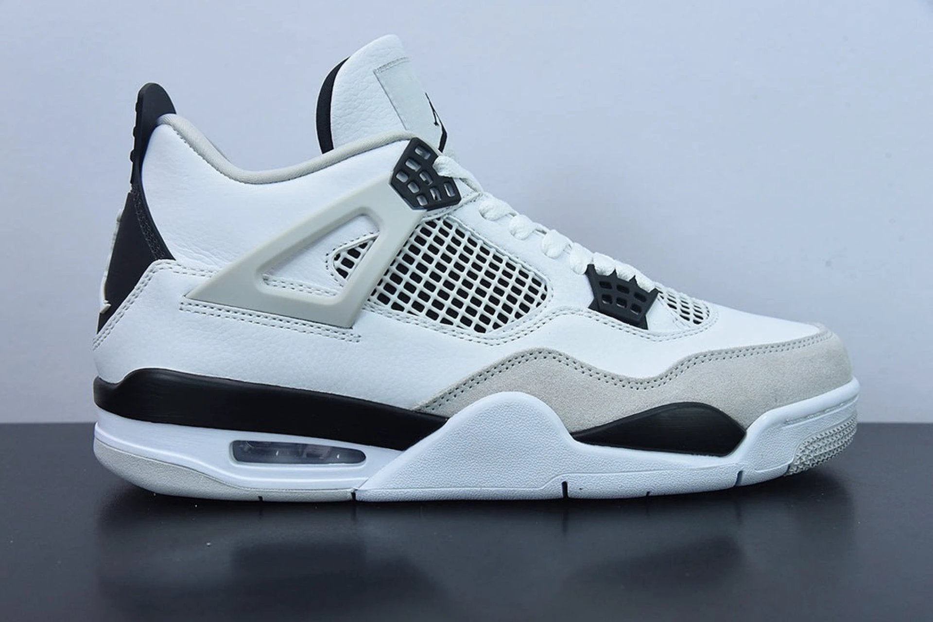 Air Jordan 4 Retro Military Black by Air Jordan