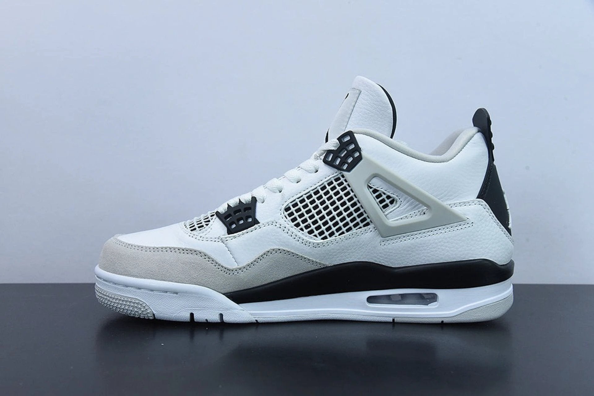 Air Jordan 4 Retro Military Black by Air Jordan