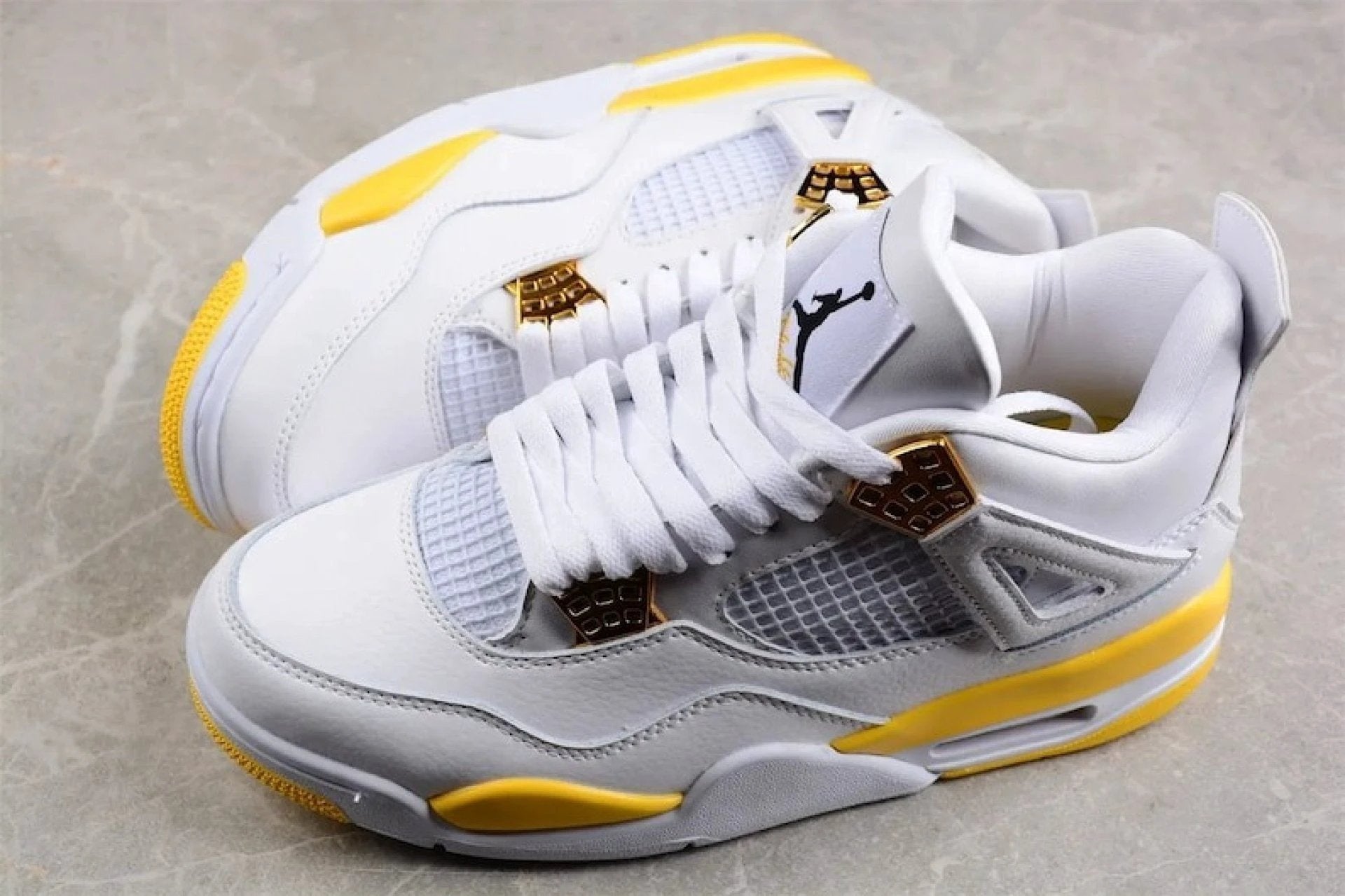 Air Jordan 4 WMNS Vivid Sulfur Unisex Sneaker by Air Jordan