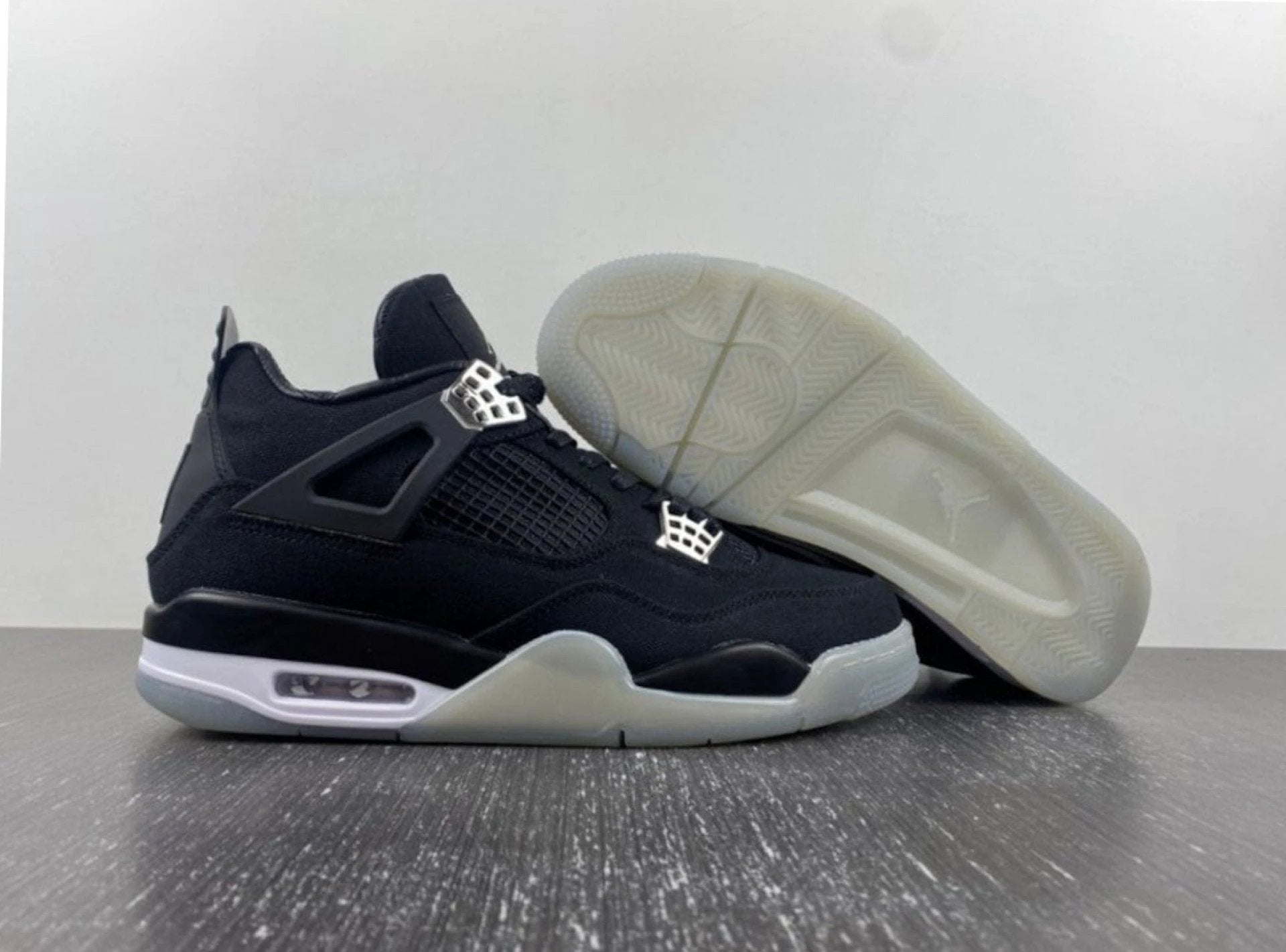 Eminem x Carhartt x Air Jordan 4 Retro 'Black Chrome' by Air Jordan