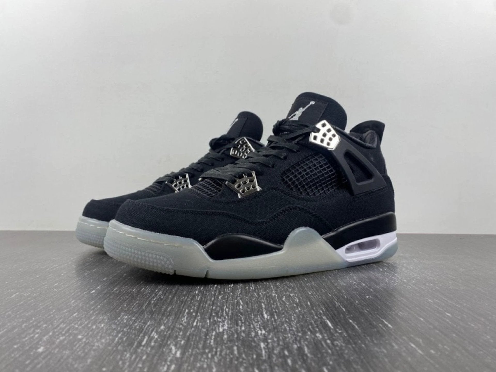 Eminem x Carhartt x Air Jordan 4 Retro 'Black Chrome' by Air Jordan