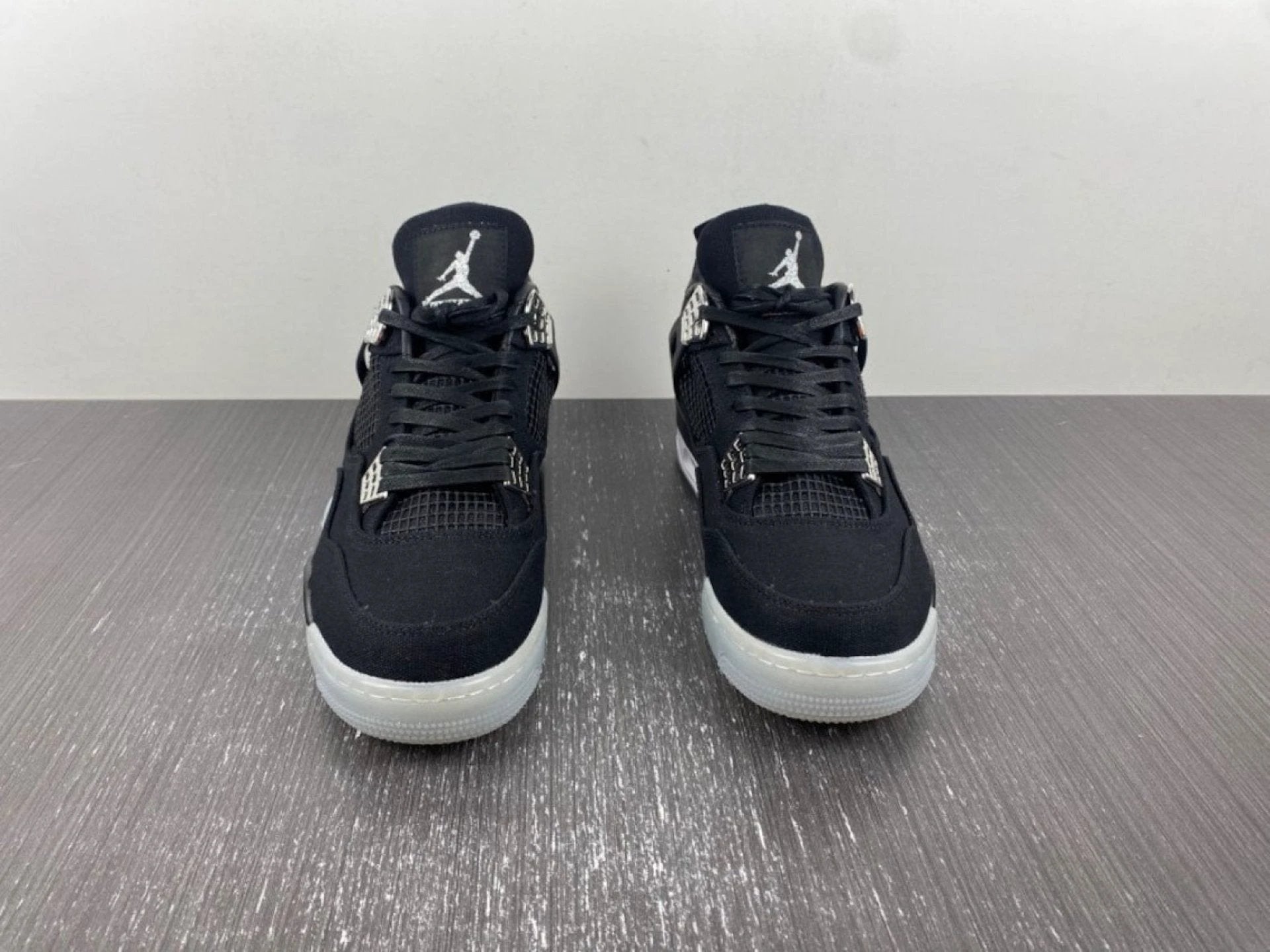 Eminem x Carhartt x Air Jordan 4 Retro 'Black Chrome' by Air Jordan