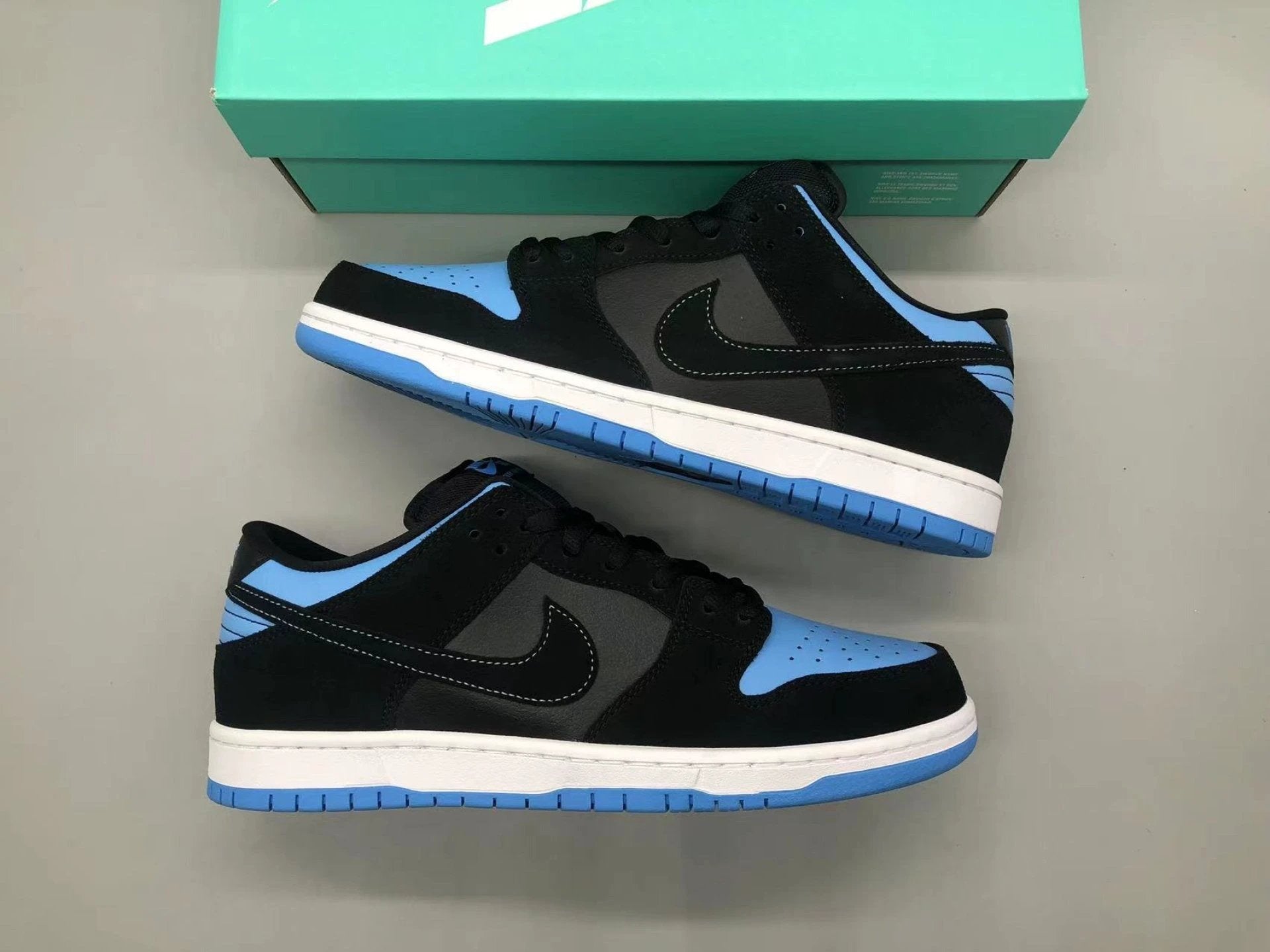 SB Dunk Low Black University Blue by Air Jordan