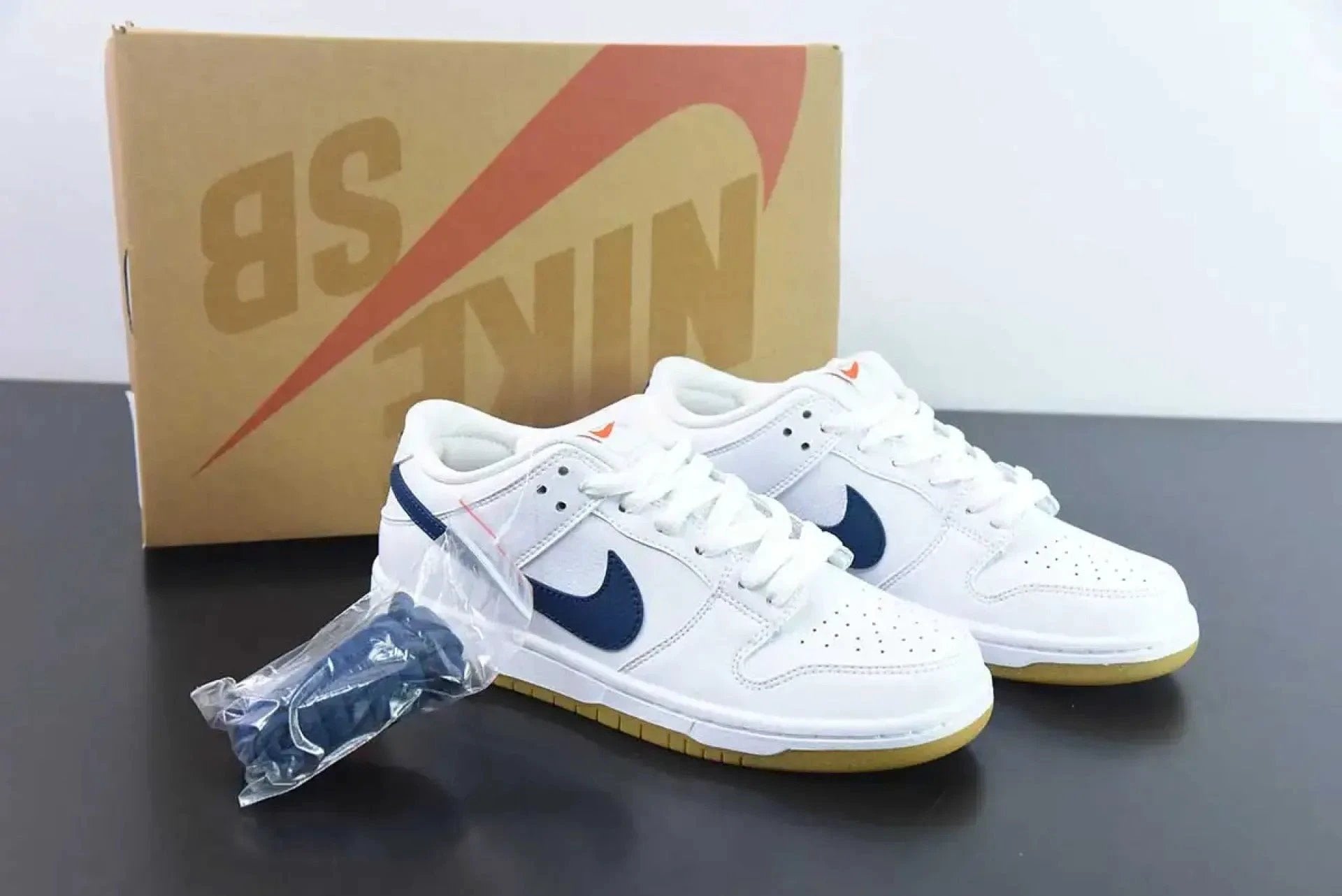 SB Dunk Low Orange Label White Navy by Air Jordan