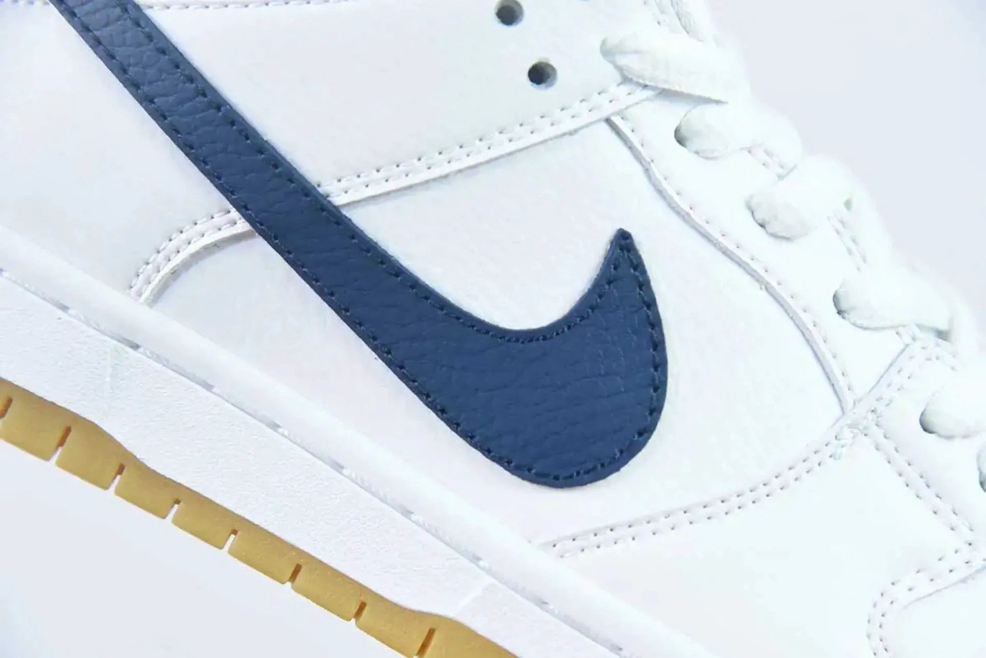 SB Dunk Low Orange Label White Navy by Air Jordan