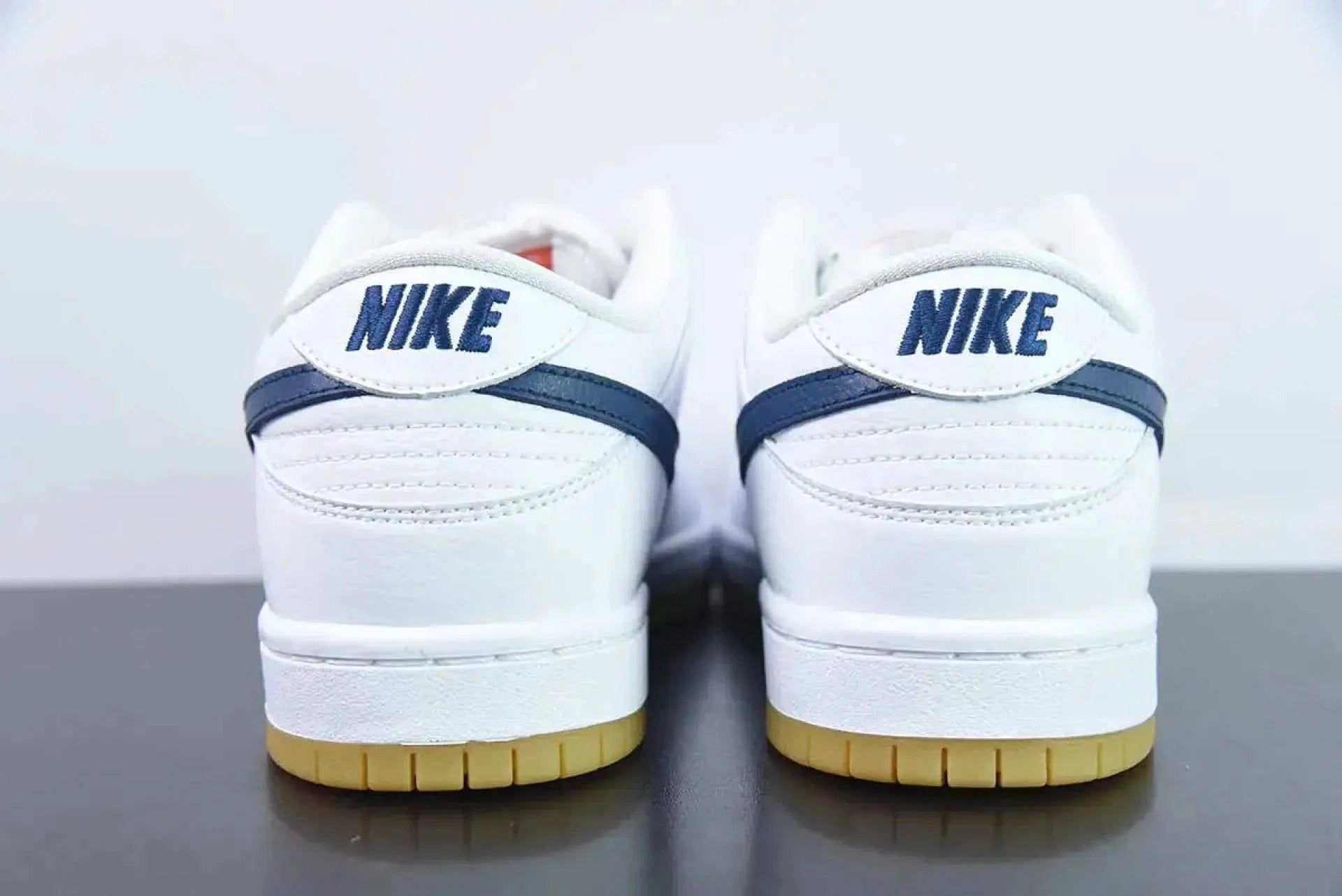 SB Dunk Low Orange Label White Navy by Air Jordan