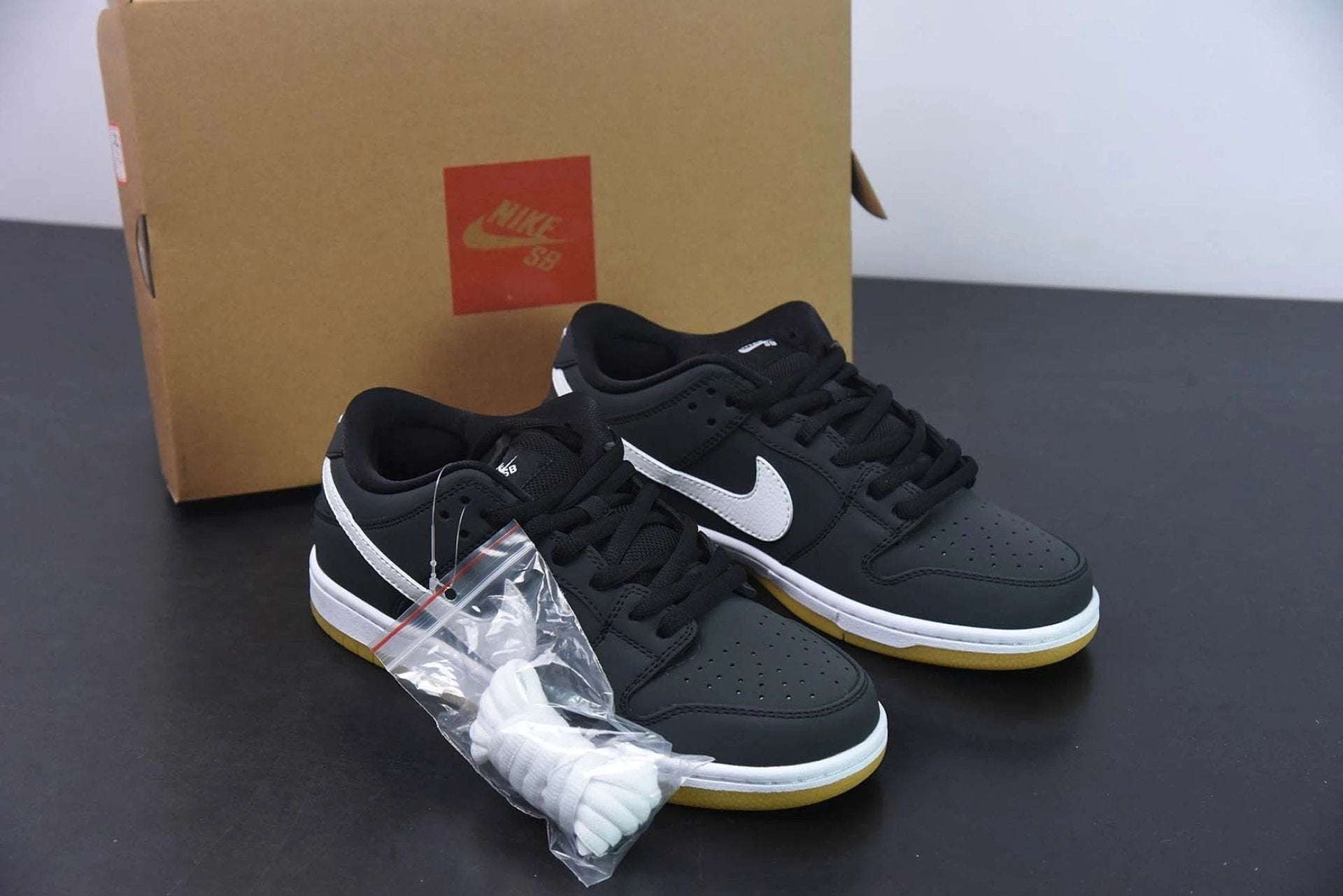 SB Dunk Low Orange Label Black White Gum by Air Jordan