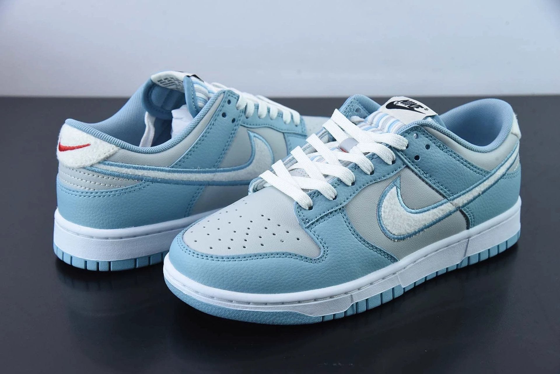 Dunk Low Retro Fleece Swoosh Worn Blue by Air Jordan