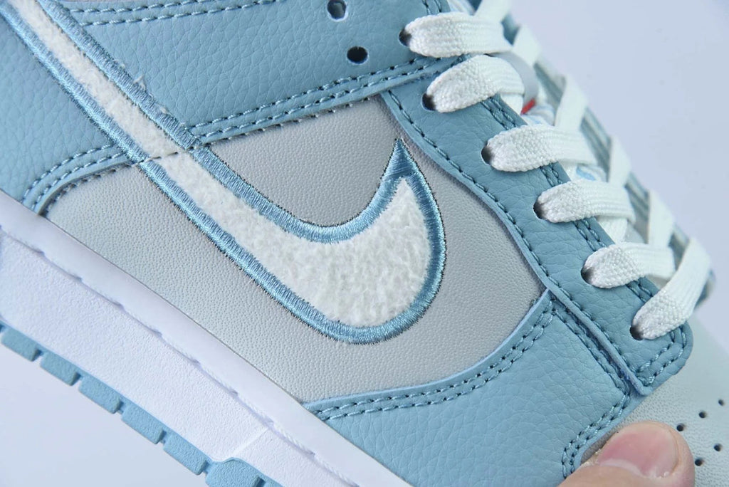 Dunk Low Retro Fleece Swoosh Worn Blue by Air Jordan