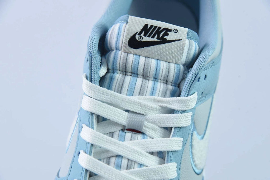 Dunk Low Retro Fleece Swoosh Worn Blue by Air Jordan
