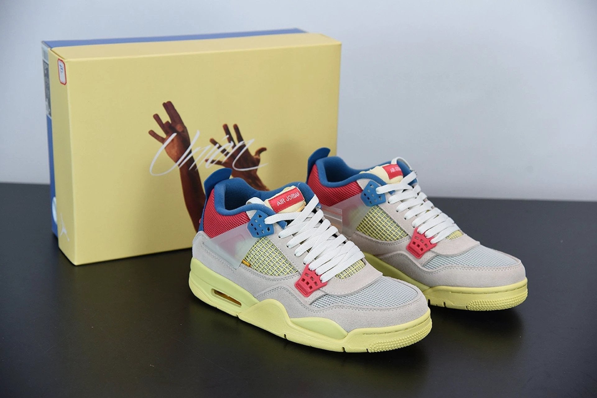 Air Jordan 4 Retro Union Guava Ice by Air Jordan