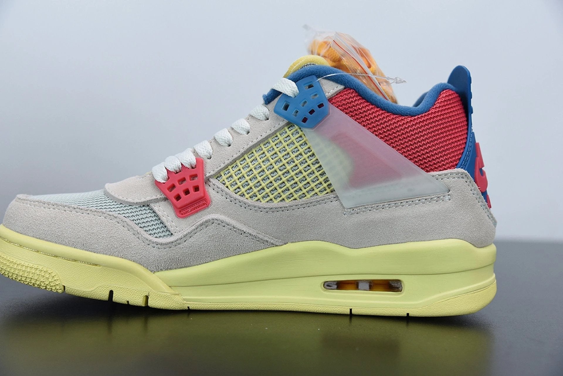 Air Jordan 4 Retro Union Guava Ice by Air Jordan