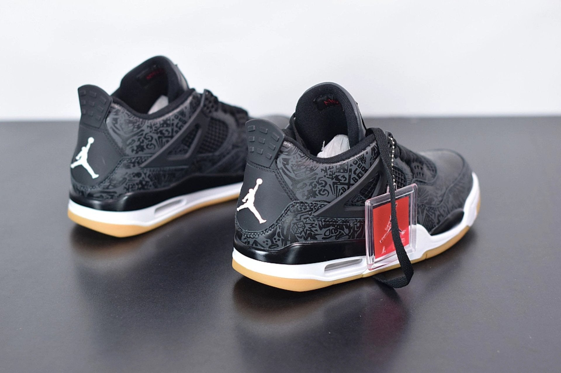 Air Jordan 4 Retro Laser Black Gum by Air Jordan