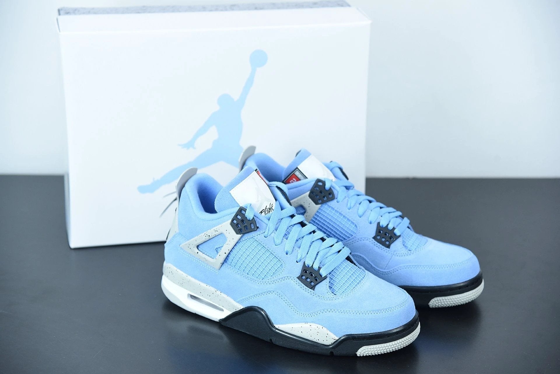 Air Jordan 4 Retro University Blue by Air Jordan