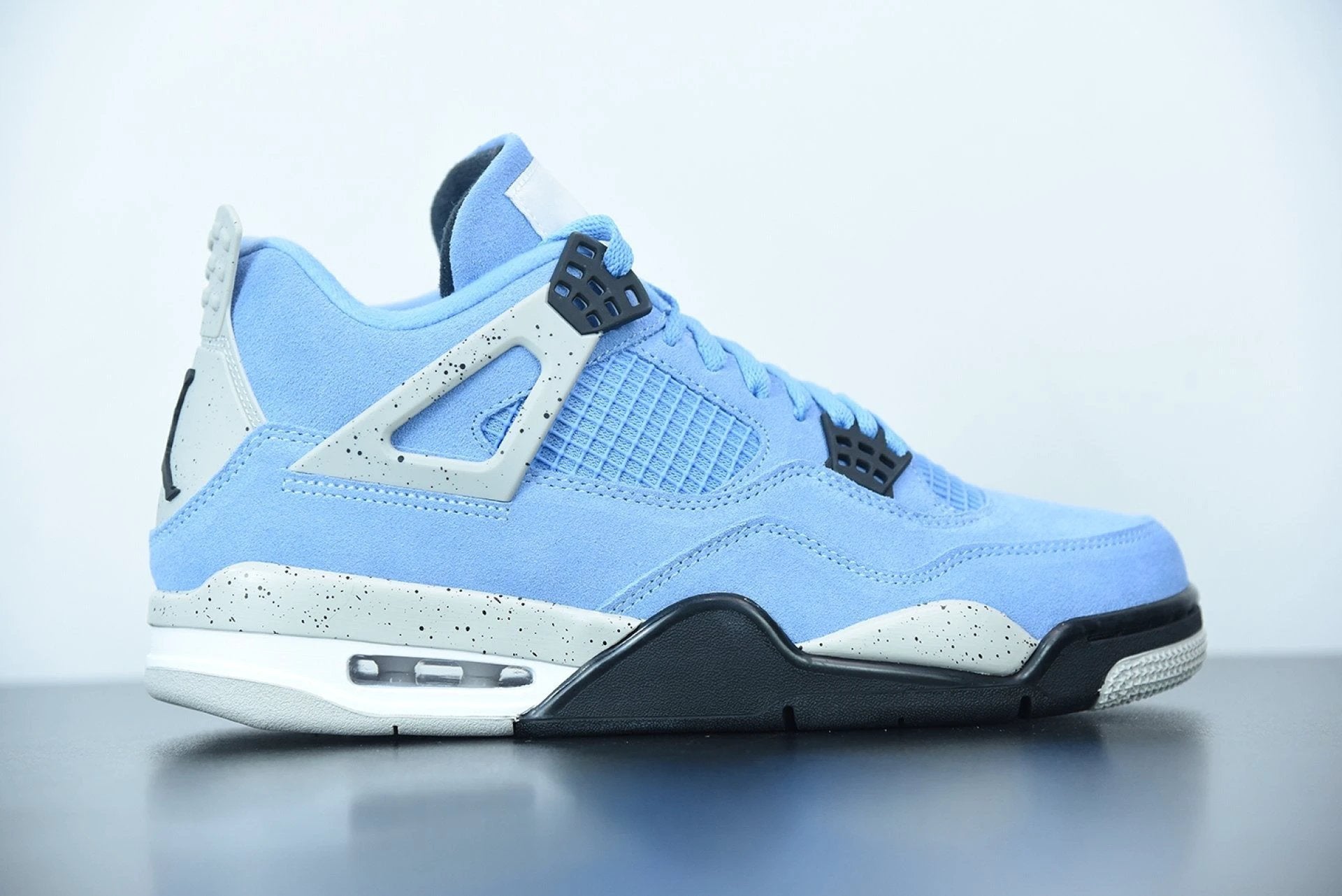 Air Jordan 4 Retro University Blue by Air Jordan