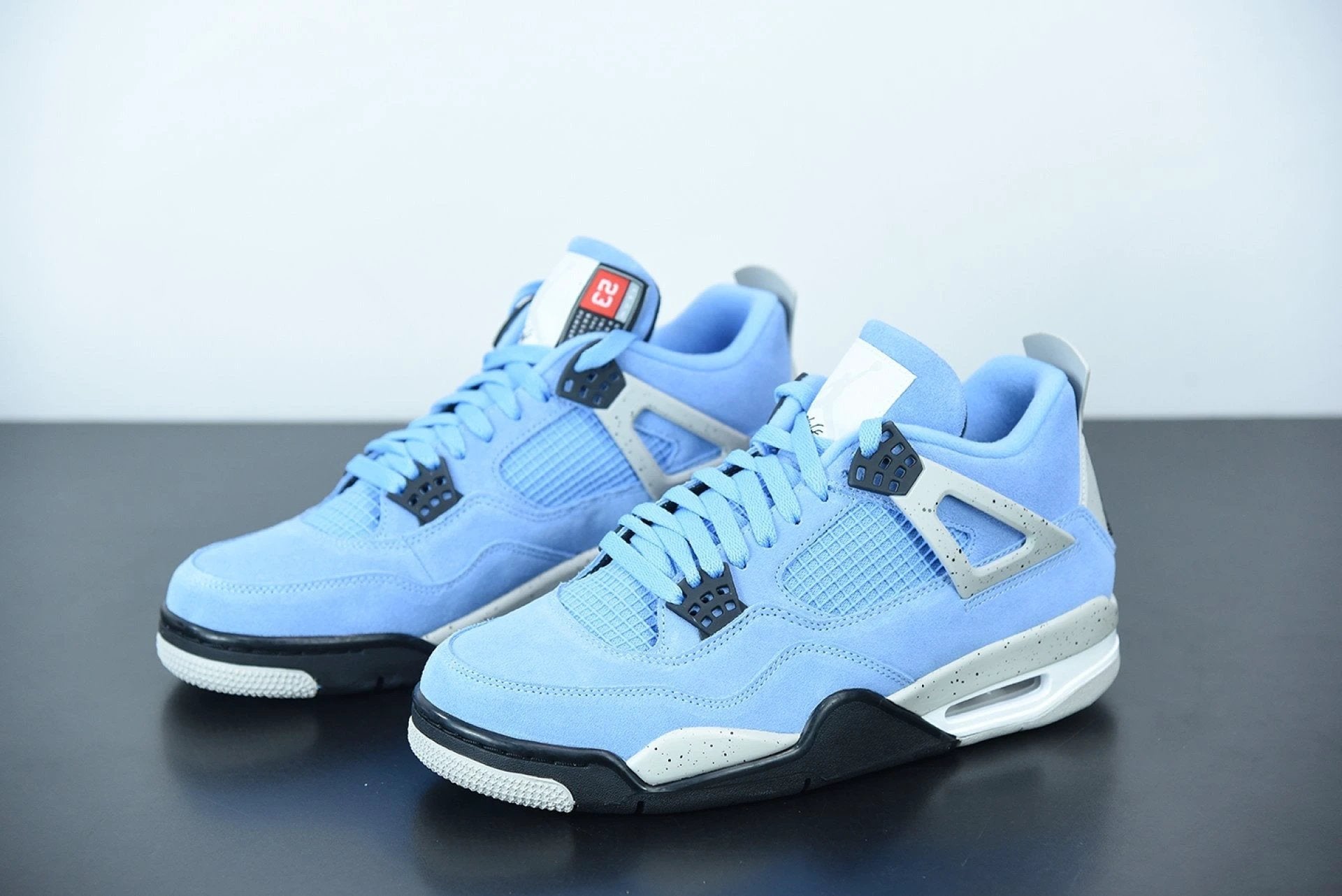 Air Jordan 4 Retro University Blue by Air Jordan