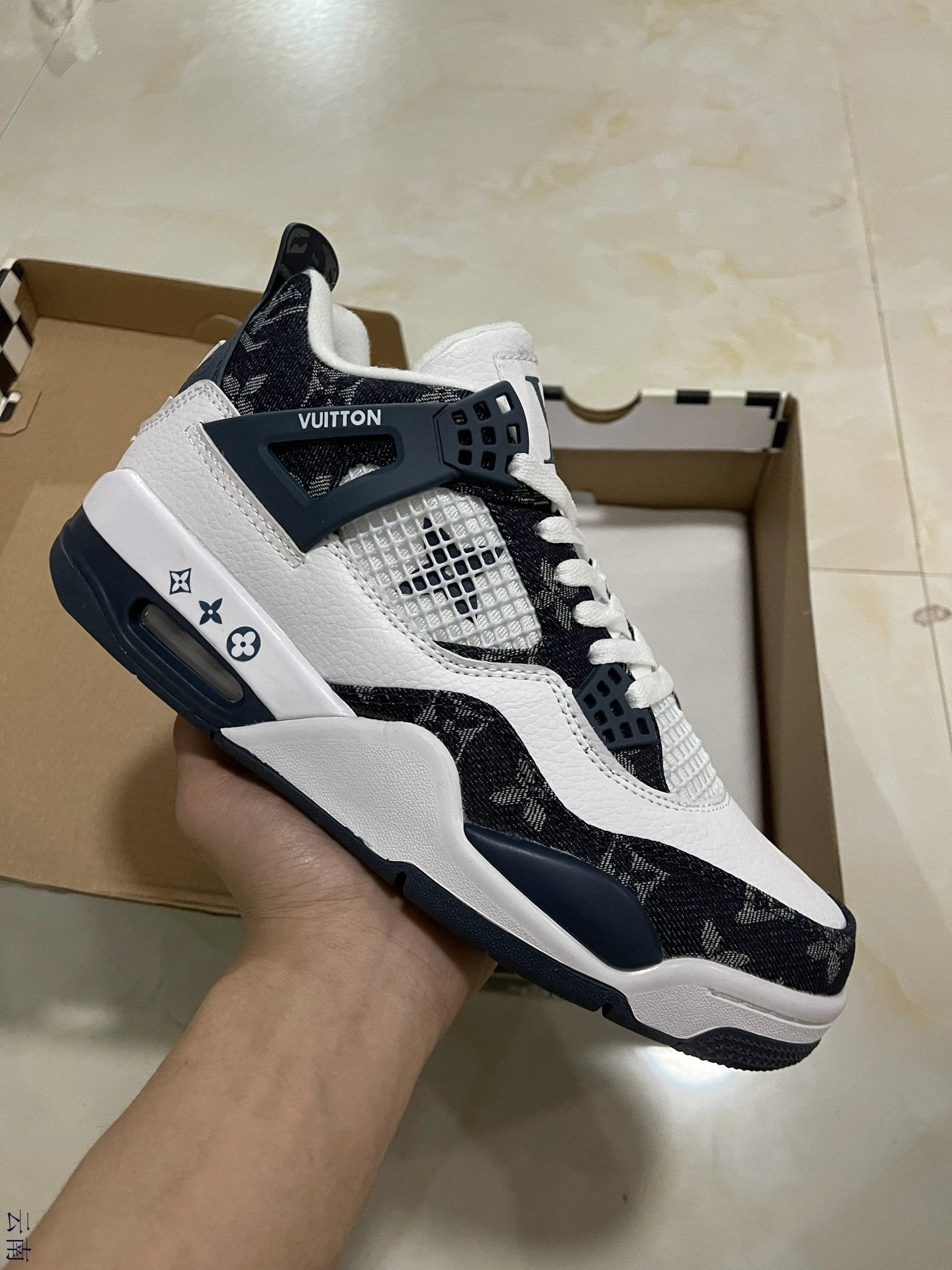 Air Jordan 4 Retro Black by Air Jordan