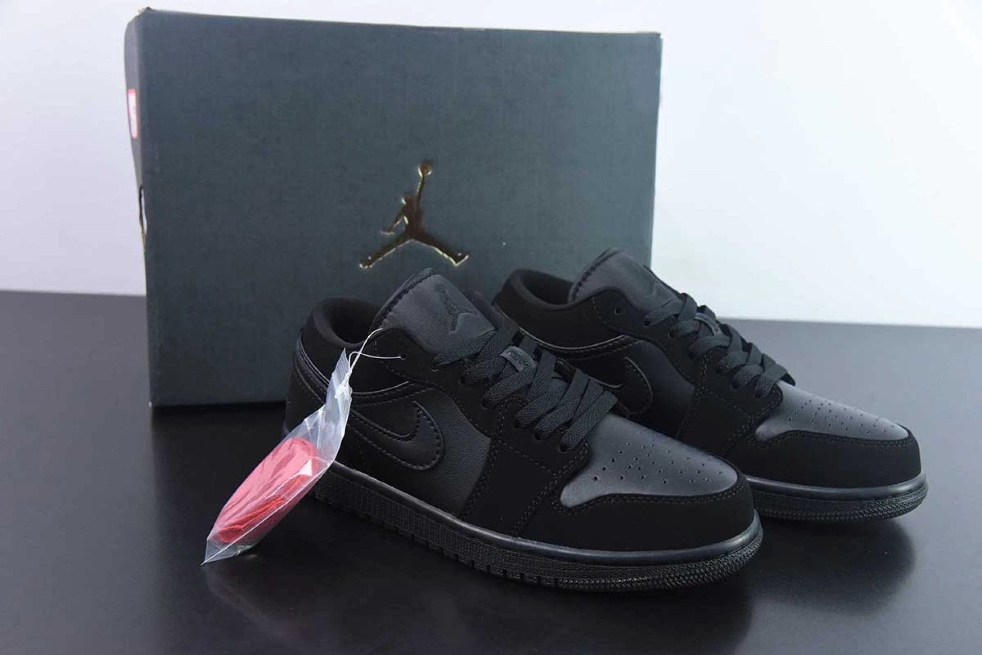 Air Jordan 1 Retro Low Triple Black by Air Jordan