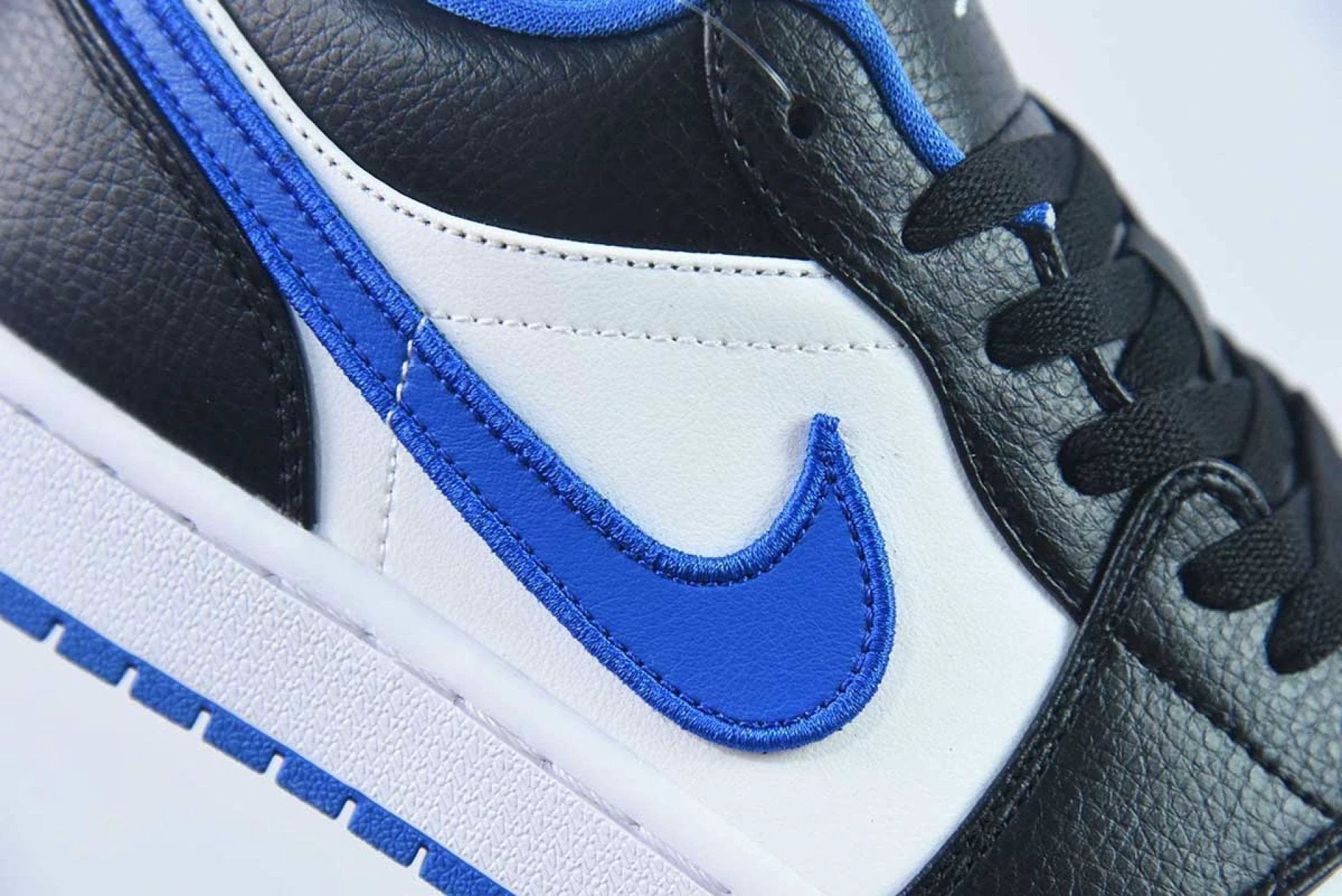 Air Jordan 1 Low Black Game Royal Metallic Platinum by Air Jordan