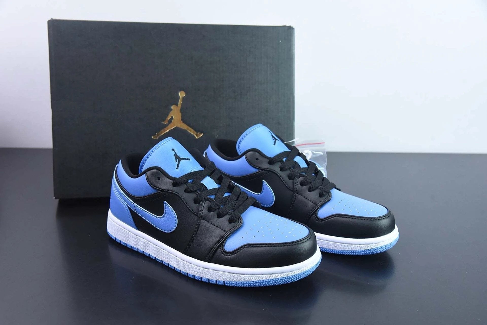Air Jordan 1 Low Black University Blue by Air Jordan