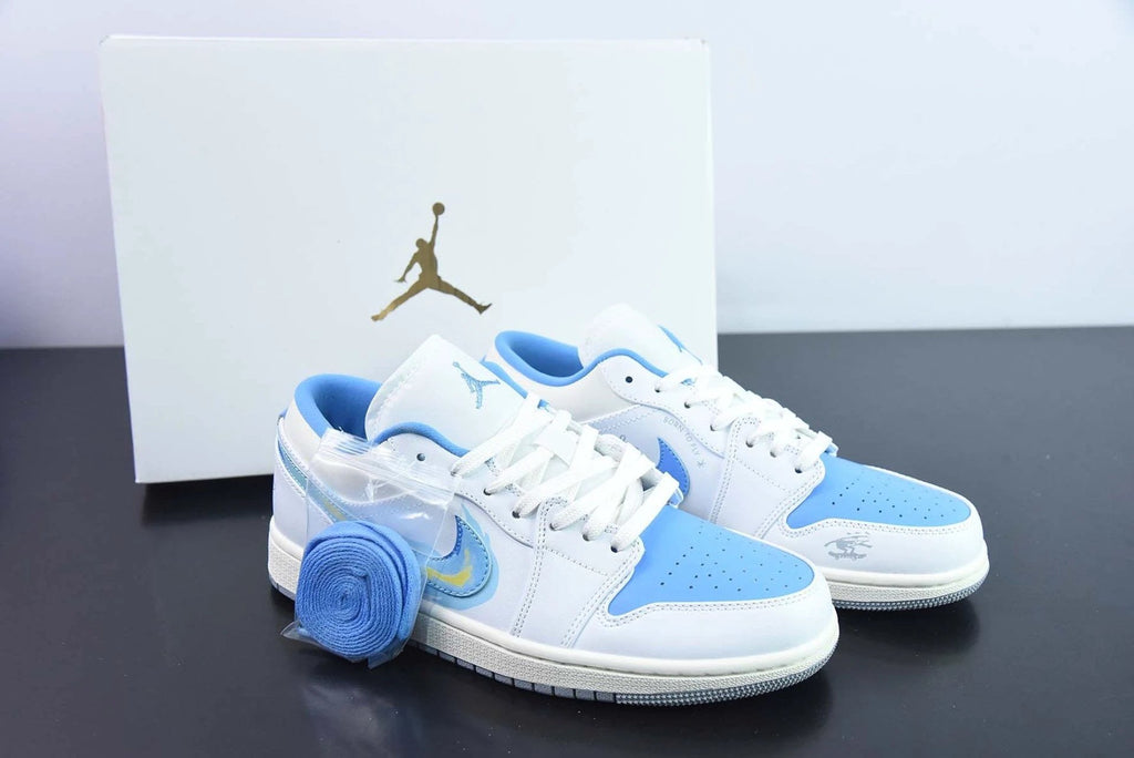 Air Jordan 1 Low “Born To Fly” Appears In University Blue by Air Jordan