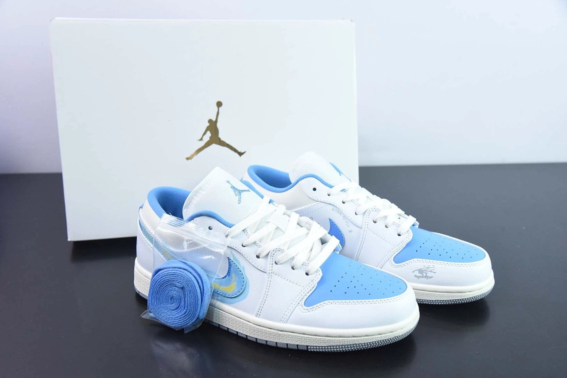 Air Jordan 1 Low “Born To Fly” Appears In University Blue by Air Jordan