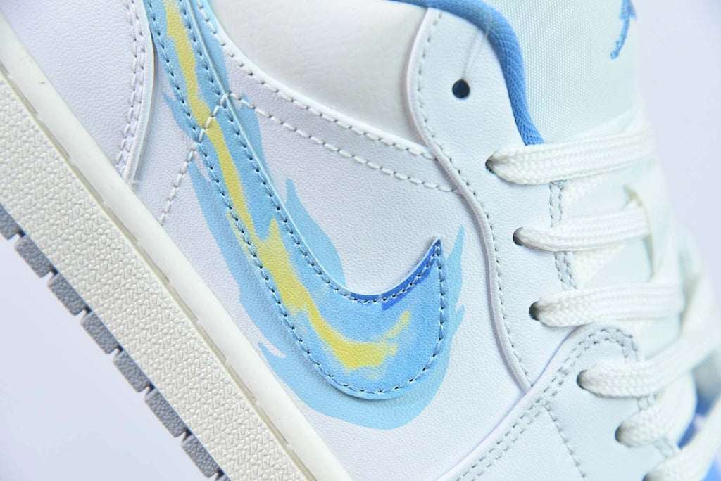 Air Jordan 1 Low “Born To Fly” Appears In University Blue by Air Jordan