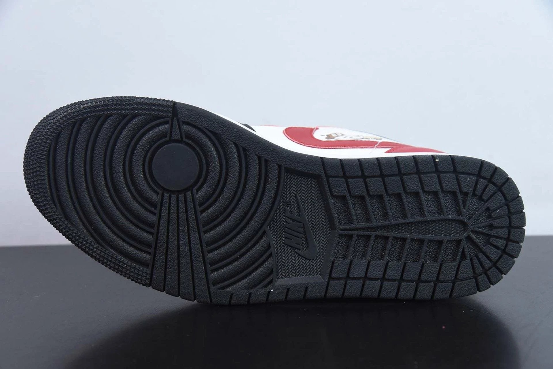 Air Jordan 1 Low GS Flaming Swoosh by Air Jordan