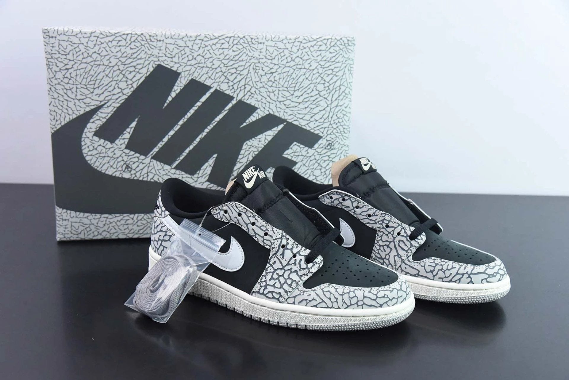 Air Jordan 1 Retro Low OG Black Cement by Air Jordan