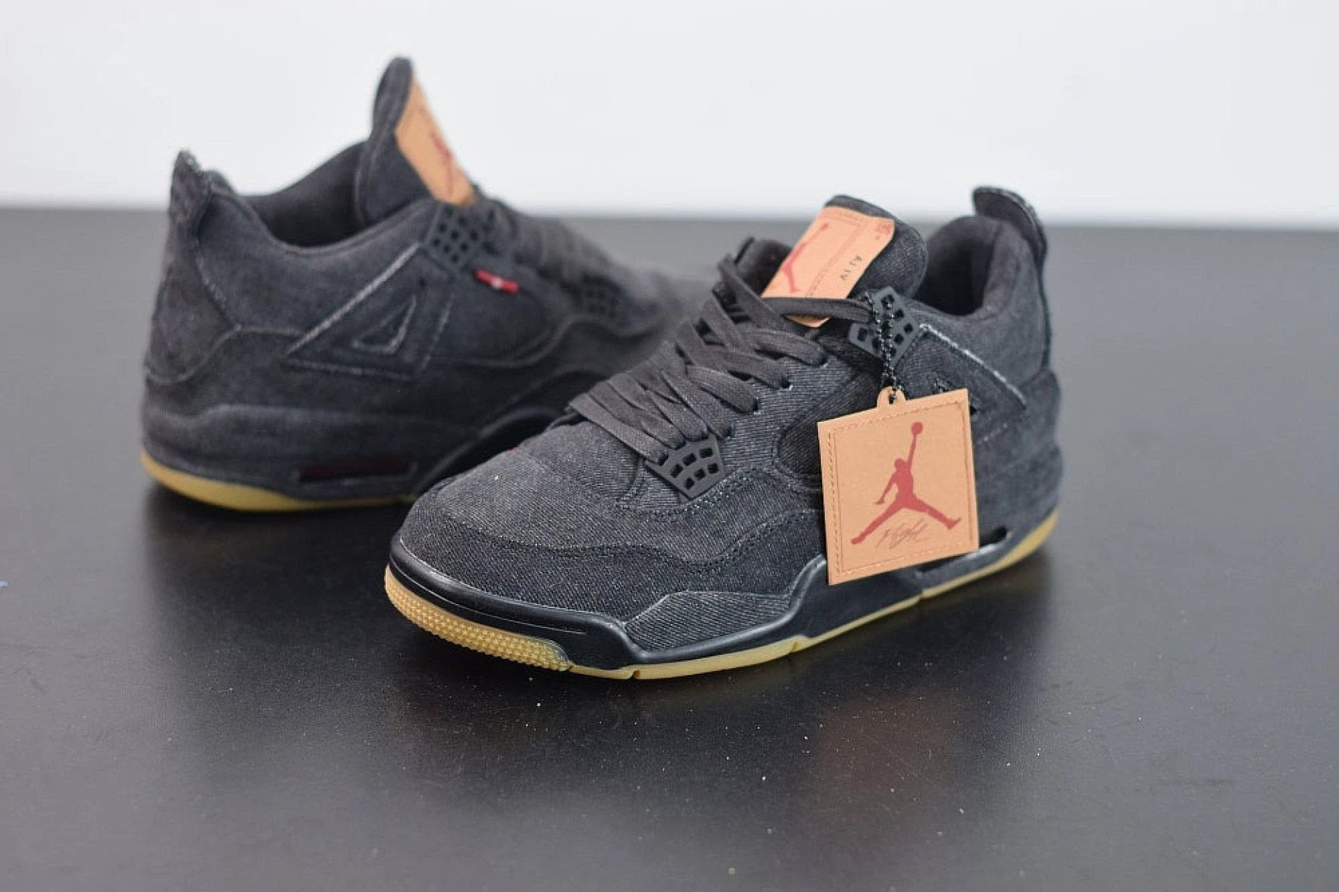 Air Jordan 4 Retro Levi's Black (Levi's Tag) by Air Jordan