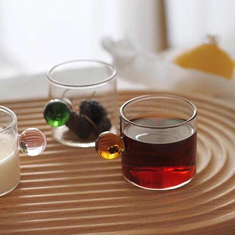 Globe Handle Glass Espresso Cup by Bowlift