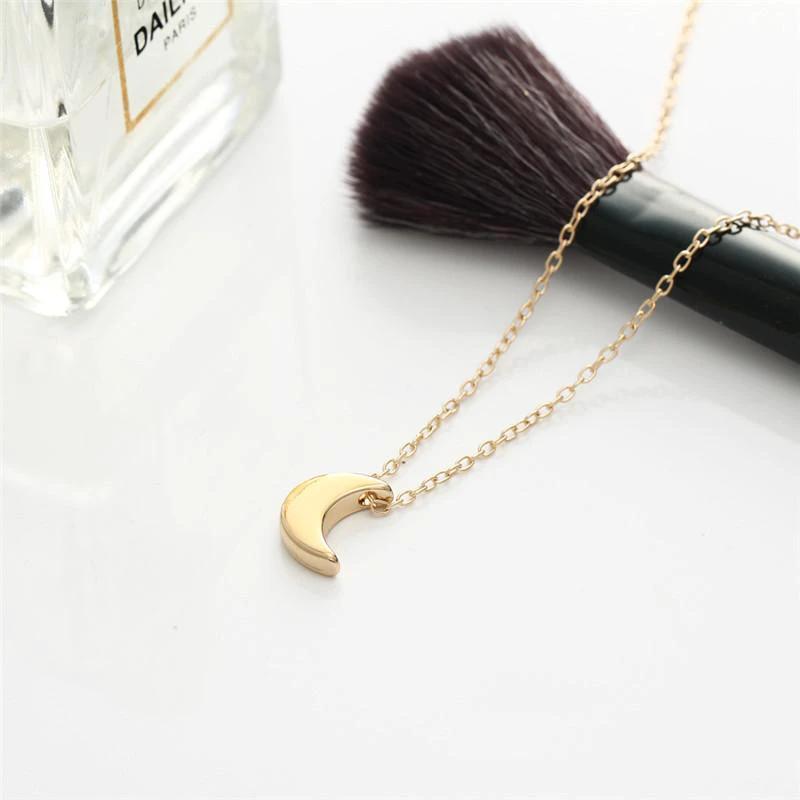 Mini Crescent Moon Pendant Necklace by Bowlift
