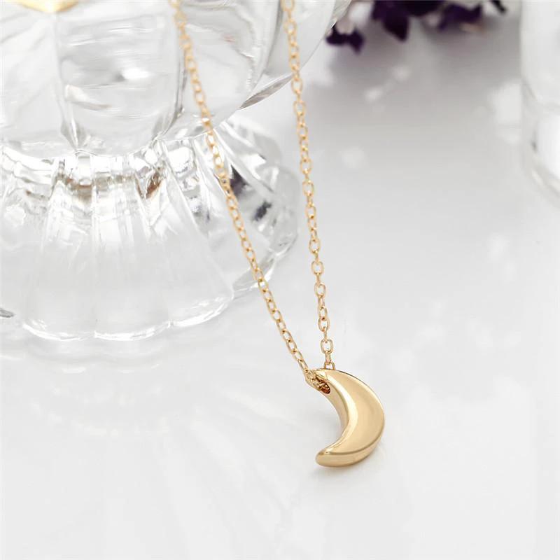 Mini Crescent Moon Pendant Necklace by Bowlift