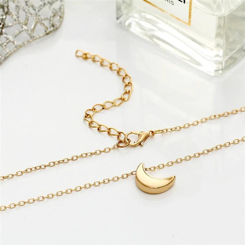 Mini Crescent Moon Pendant Necklace by Bowlift