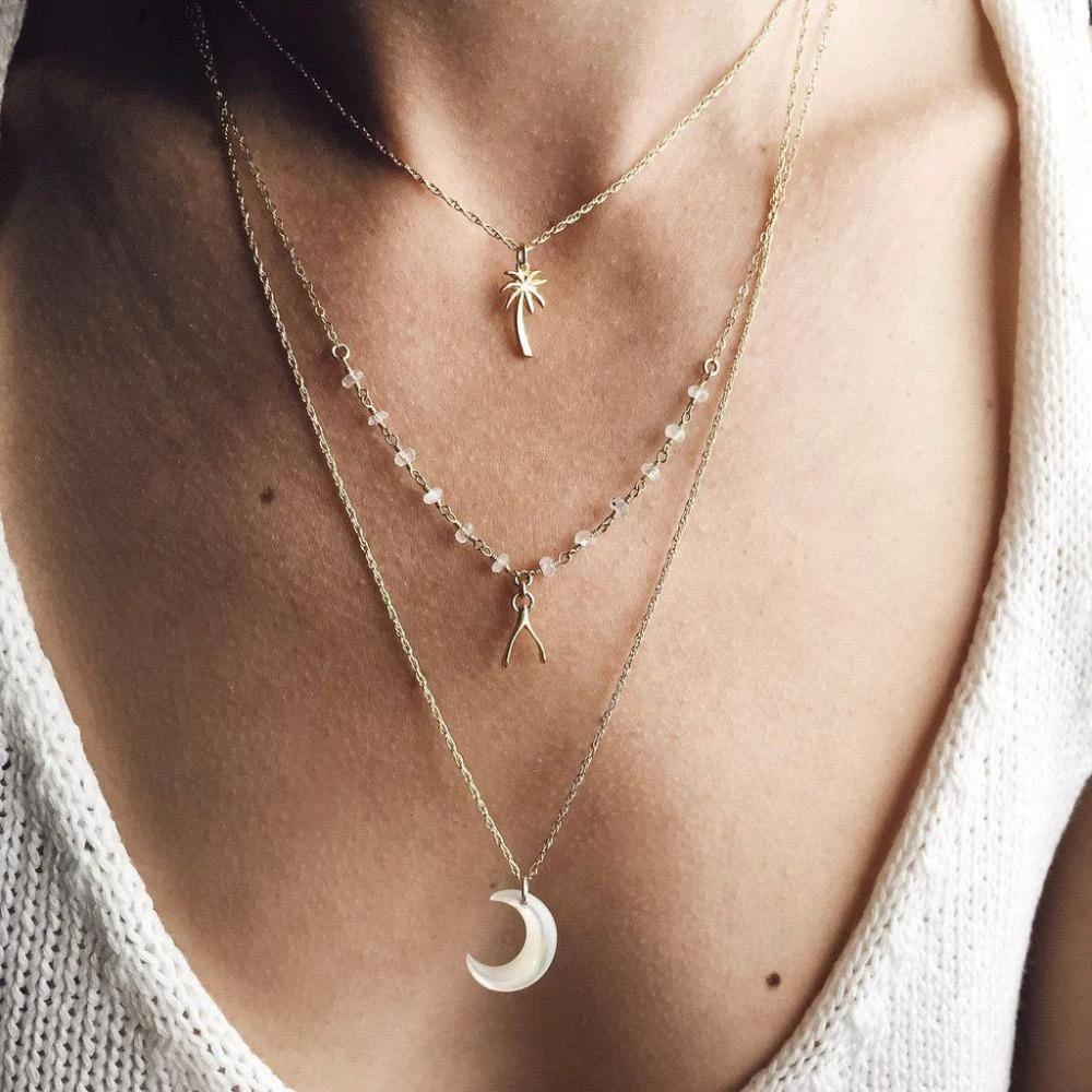Multi Layered Boho Coconut Tree, Wish Bone, Moon Pendant Necklace by Bowlift